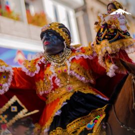 Rebecca Adventure Travel Mama Negra PArade