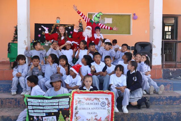 Rebecca Adventure Travel team and kids at Antonio de Ulloa school.
